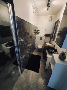 Koupelna v ubytování Apartament 400 m od molo Międzyzdroje
