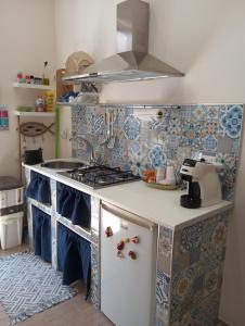 Kuchyň nebo kuchyňský kout v ubytování Goccia del mare