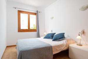 Postel nebo postele na pokoji v ubytování Al Pujol