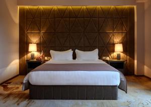 Кровать или кровати в номере Aurora Resort by Stellar Hotels, Tsaghkadzor