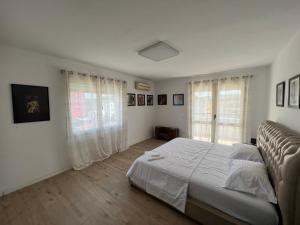 Postel nebo postele na pokoji v ubytování Urban Comfort Oasis