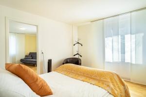 Postel nebo postele na pokoji v ubytování Lodge 21