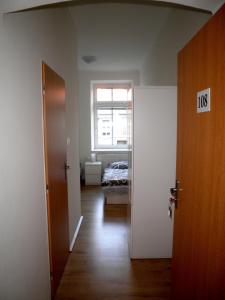 Postel nebo postele na pokoji v ubytování Centrum Ubytování Břeclav