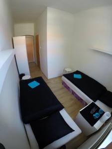 Postel nebo postele na pokoji v ubytování Centrum Ubytování Břeclav