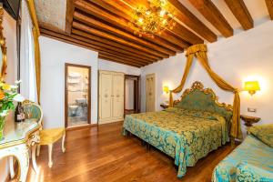 Postel nebo postele na pokoji v ubytování Hotel Al Vagon