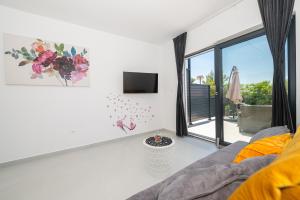 Et tv og/eller underholdning på Apartmani Tona