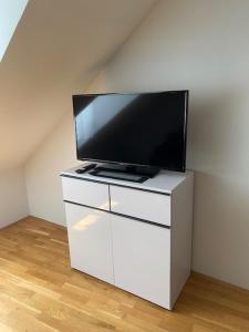 TV a/nebo společenská místnost v ubytování Paky Appartements 00316