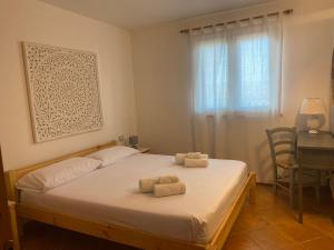 A bed or beds in a room at Sunshine House