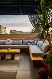 a couch sitting on top of a roof at Just 4 You in Komiža +47 photos