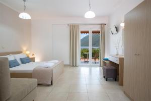 Postel nebo postele na pokoji v ubytování Menes Hotel