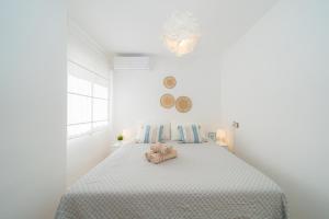 Posteľ alebo postele v izbe v ubytovaní Zélia Rooftop Apartment