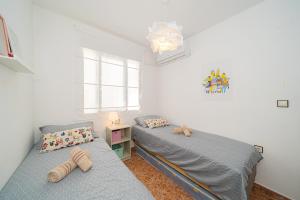 Posteľ alebo postele v izbe v ubytovaní Zélia Rooftop Apartment + 13 fotografií