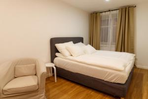 Postel nebo postele na pokoji v ubytování Apartmany Tachov - Tiny House