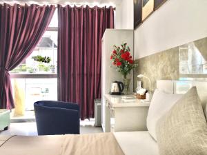 Posezení v ubytování SaiGon CoZy Hotel "241 Pham Ngu Lao Street''