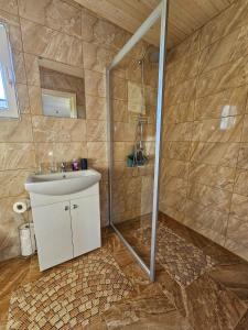 Kúpeľňa v ubytovaní R&J Venslaviskiai
