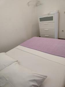 Una cama o camas en una habitación de Apartments Jure