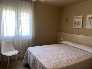 A bed or beds in a room at ARGONAVIS PB A Még 5 kép