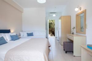 Postel nebo postele na pokoji v ubytování Menes Hotel