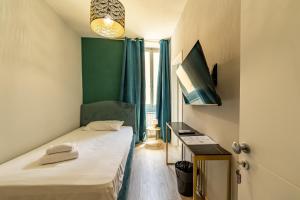 TV a/nebo společenská místnost v ubytování Room Eleven + 50 fotografií