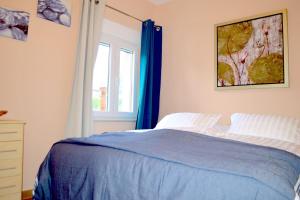 Postel nebo postele na pokoji v ubytování Wohnung mit Meerblick Romy