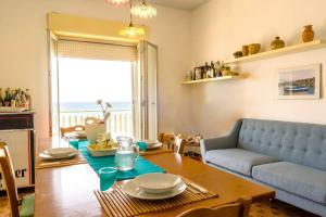 Posezení v ubytování Sea paradise - il mare sotto la finestra + 5 fotografií