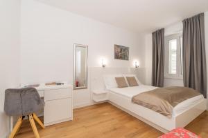Postel nebo postele na pokoji v ubytování IL Cetro Spalato Rooms