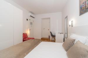 Postel nebo postele na pokoji v ubytování IL Cetro Spalato Rooms