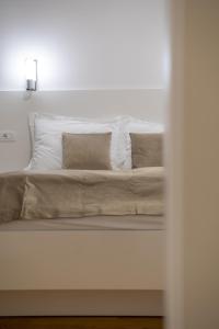 Postel nebo postele na pokoji v ubytování IL Cetro Spalato Rooms
