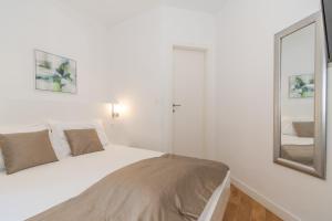 Postel nebo postele na pokoji v ubytování IL Cetro Spalato Rooms
