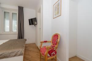 Postel nebo postele na pokoji v ubytování IL Cetro Spalato Rooms