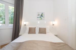 Postel nebo postele na pokoji v ubytování IL Cetro Spalato Rooms