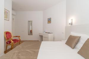 Postel nebo postele na pokoji v ubytování IL Cetro Spalato Rooms