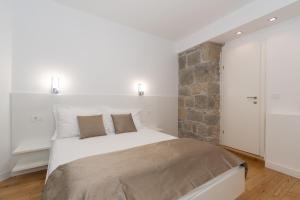 Postel nebo postele na pokoji v ubytování IL Cetro Spalato Rooms