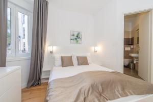 Postel nebo postele na pokoji v ubytování IL Cetro Spalato Rooms