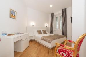 Postel nebo postele na pokoji v ubytování IL Cetro Spalato Rooms