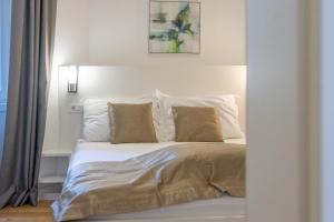 Postel nebo postele na pokoji v ubytování IL Cetro Spalato Rooms