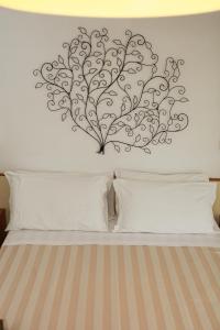 Postel nebo postele na pokoji v ubytování Hotel Solitude + 16 fotografií