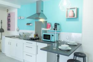 Kjøkken eller kjøkkenkrok på Le Florida : Proche Roissy CDG - Paris - Astérix