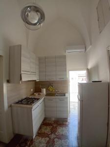 A kitchen or kitchenette at Casa Paola