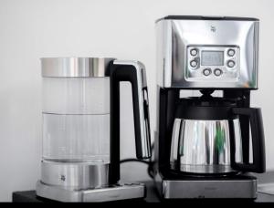 a coffee maker sitting on top of a counter at Comfort Apart Baden-Baden in Baden-Baden