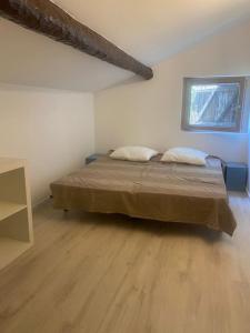 Llit o llits en una habitació de Maison à 20 min des plages de Sainte Maxime
