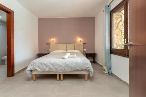 Postel nebo postele na pokoji v ubytování Villa Amistad + 23 fotografií