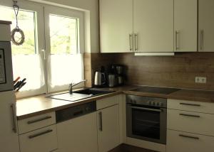 Dapur atau dapur kecil di Ferienhaus Lorenz` Gartentraum - Emsland