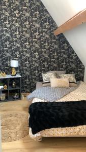 Postel nebo postele na pokoji v ubytování Gite de charme 6 pers avec SPA privé