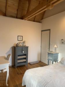 Postel nebo postele na pokoji v ubytování Gite de charme 6 pers avec SPA privé