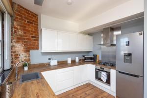 Küche/Küchenzeile in der Unterkunft Au luxury apartment - free parking