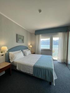 Postel nebo postele na pokoji v ubytování Hotel Excelsior Bay + 37 fotografií