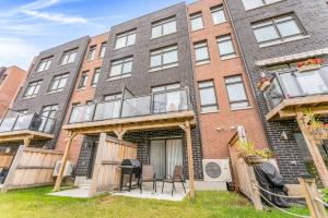 an exterior view of a brick building with windows at Home away from Home - Remote Office - Vacation Stay in Vaughan