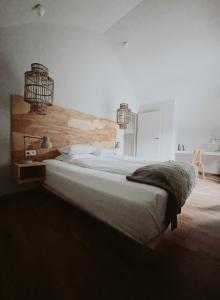 Posteľ alebo postele v izbe v ubytovaní Cisowy Zakątek