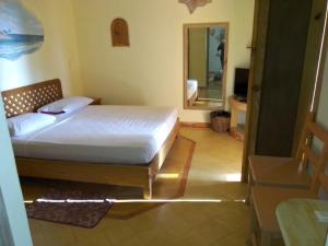 Voodi või voodid majutusasutuse Hotel - Residencial Madrugada toas
